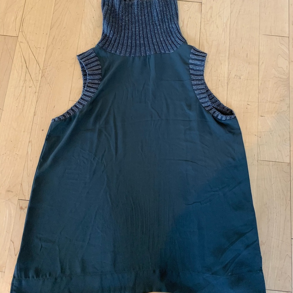 Sleeveless see through blouse